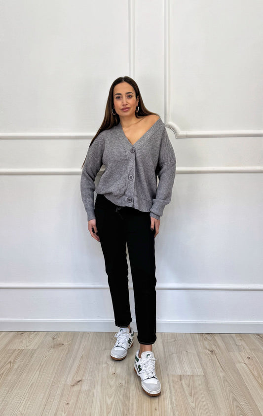 Jeans nero con impunture