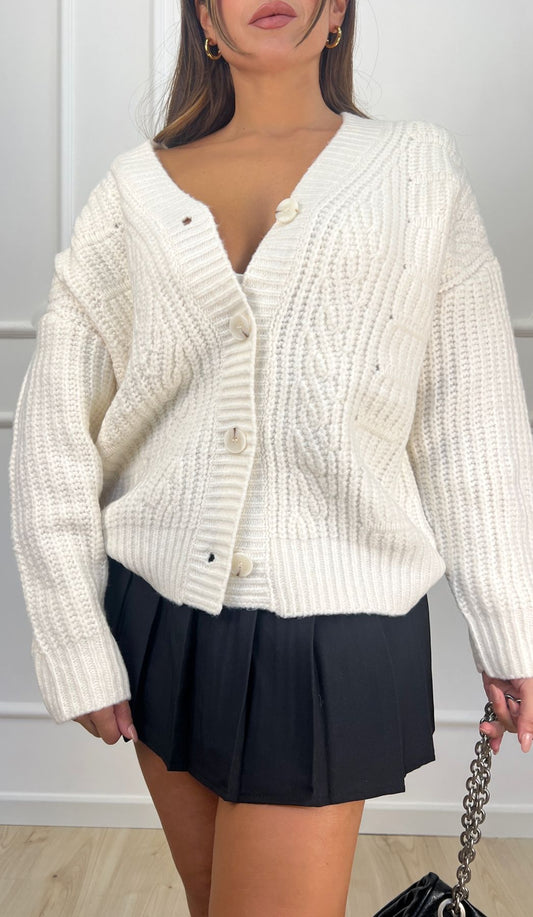 Cardigan over con trecce