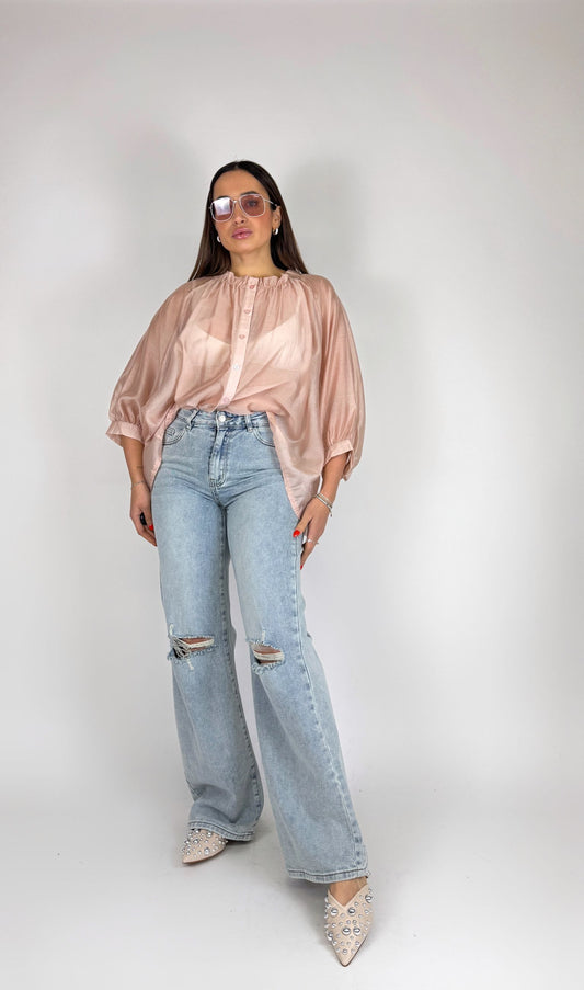 Jeans gamba larga con strappi