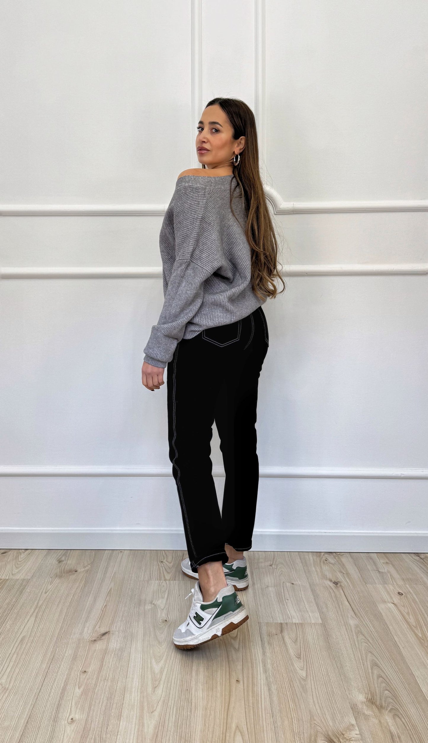 Jeans nero con impunture